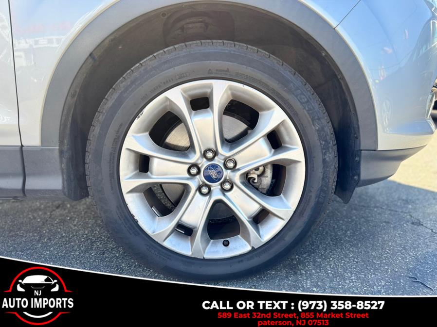2014 Ford Escape 4WD 4dr Titanium, available for sale in Paterson, New Jersey | NJ Auto Imports. Paterson, New Jersey 2014 Ford Escape 4WD 4dr Titanium, available for sale in Paterson, New Jersey | NJ Auto Imports. Paterson, New Jersey
