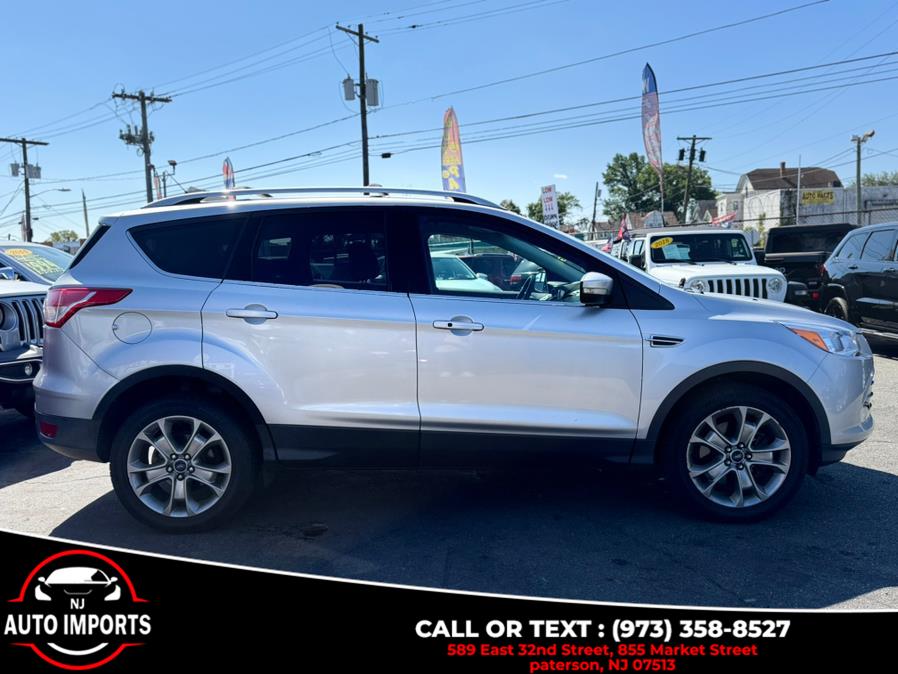 2014 Ford Escape 4WD 4dr Titanium, available for sale in Paterson, New Jersey | NJ Auto Imports. Paterson, New Jersey 2014 Ford Escape 4WD 4dr Titanium, available for sale in Paterson, New Jersey | NJ Auto Imports. Paterson, New Jersey