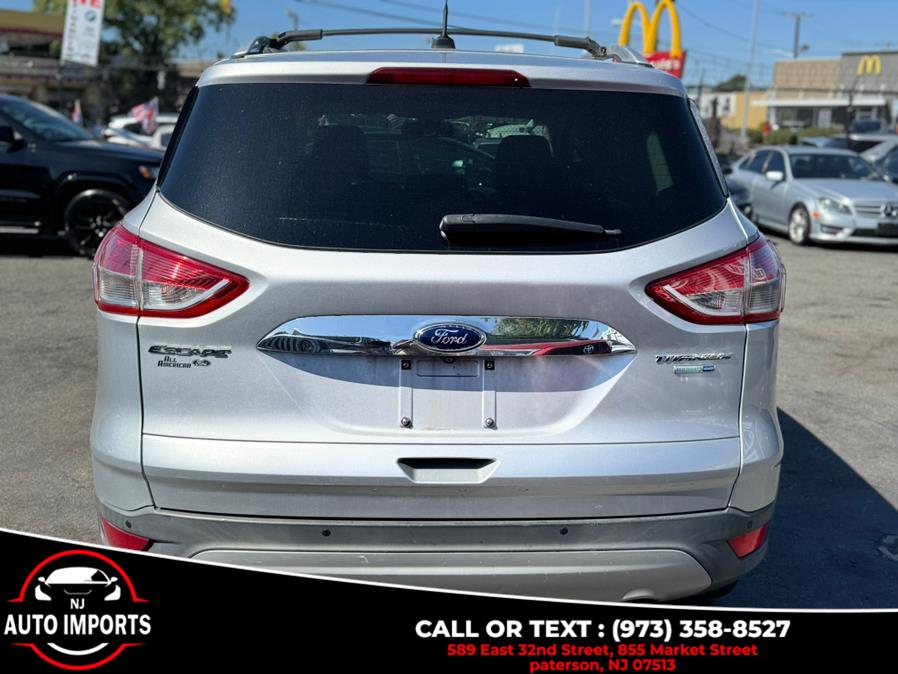 2014 Ford Escape 4WD 4dr Titanium, available for sale in Paterson, New Jersey | NJ Auto Imports. Paterson, New Jersey 2014 Ford Escape 4WD 4dr Titanium, available for sale in Paterson, New Jersey | NJ Auto Imports. Paterson, New Jersey