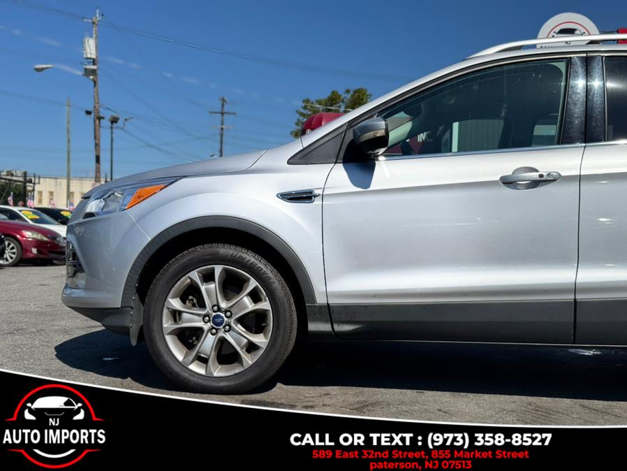 2014 Ford Escape 4WD 4dr Titanium, available for sale in Paterson, New Jersey | NJ Auto Imports. Paterson, New Jersey 2014 Ford Escape 4WD 4dr Titanium, available for sale in Paterson, New Jersey | NJ Auto Imports. Paterson, New Jersey