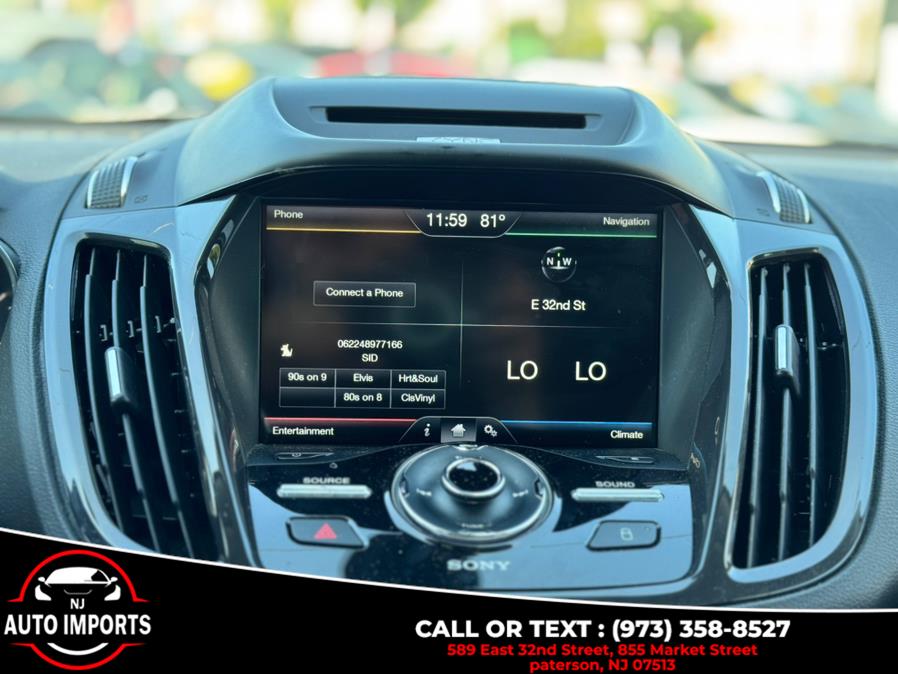 2014 Ford Escape 4WD 4dr Titanium, available for sale in Paterson, New Jersey | NJ Auto Imports. Paterson, New Jersey 2014 Ford Escape 4WD 4dr Titanium, available for sale in Paterson, New Jersey | NJ Auto Imports. Paterson, New Jersey