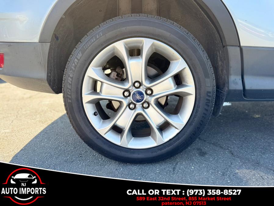 2014 Ford Escape 4WD 4dr Titanium, available for sale in Paterson, New Jersey | NJ Auto Imports. Paterson, New Jersey 2014 Ford Escape 4WD 4dr Titanium, available for sale in Paterson, New Jersey | NJ Auto Imports. Paterson, New Jersey