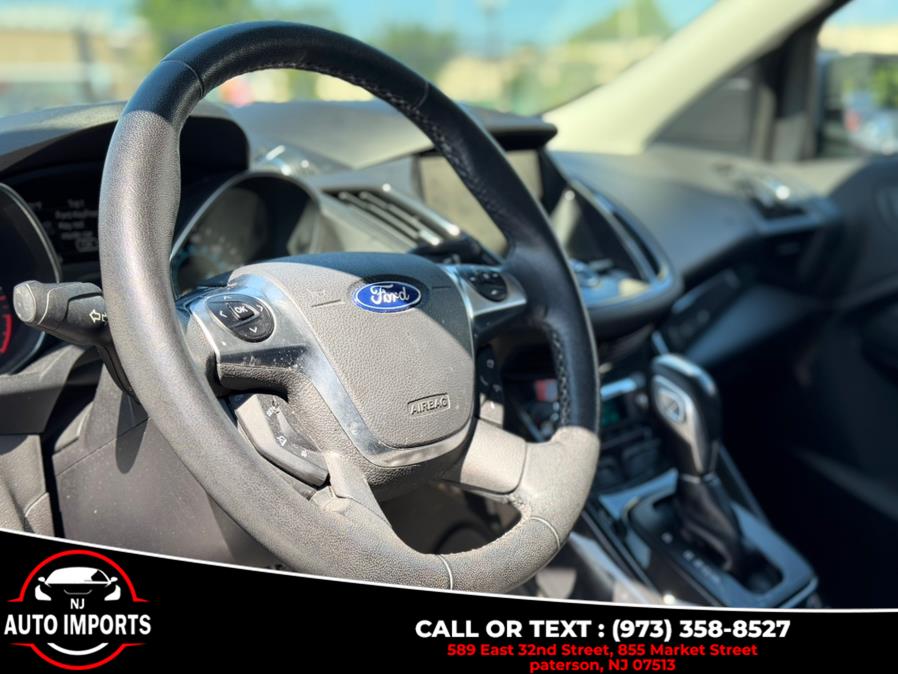 2014 Ford Escape 4WD 4dr Titanium, available for sale in Paterson, New Jersey | NJ Auto Imports. Paterson, New Jersey 2014 Ford Escape 4WD 4dr Titanium, available for sale in Paterson, New Jersey | NJ Auto Imports. Paterson, New Jersey