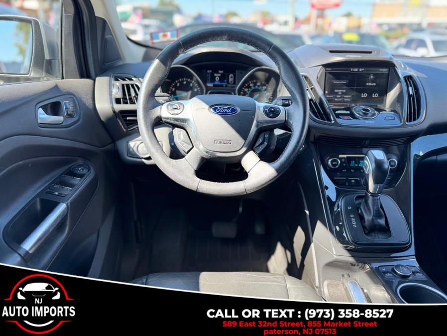 2014 Ford Escape 4WD 4dr Titanium, available for sale in Paterson, New Jersey | NJ Auto Imports. Paterson, New Jersey 2014 Ford Escape 4WD 4dr Titanium, available for sale in Paterson, New Jersey | NJ Auto Imports. Paterson, New Jersey
