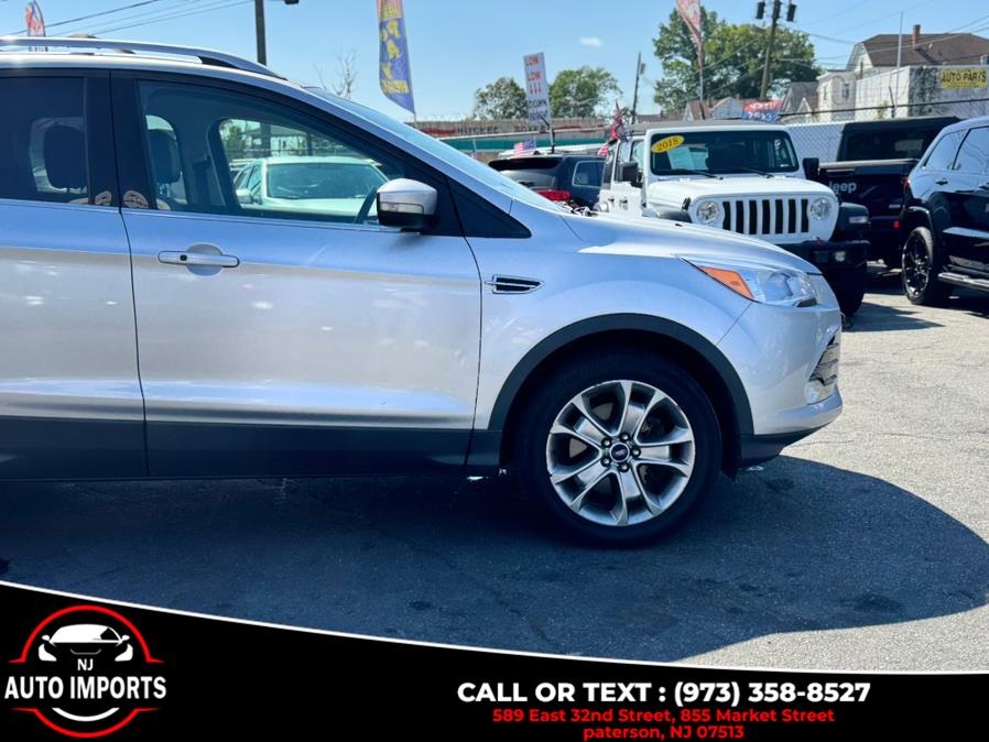 2014 Ford Escape 4WD 4dr Titanium, available for sale in Paterson, New Jersey | NJ Auto Imports. Paterson, New Jersey 2014 Ford Escape 4WD 4dr Titanium, available for sale in Paterson, New Jersey | NJ Auto Imports. Paterson, New Jersey