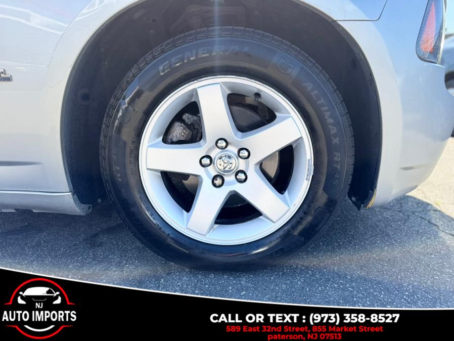 2010 Dodge Charger 4dr Sdn SXT RWD, available for sale in Paterson, New Jersey | NJ Auto Imports. Paterson, New Jersey 2010 Dodge Charger 4dr Sdn SXT RWD, available for sale in Paterson, New Jersey | NJ Auto Imports. Paterson, New Jersey