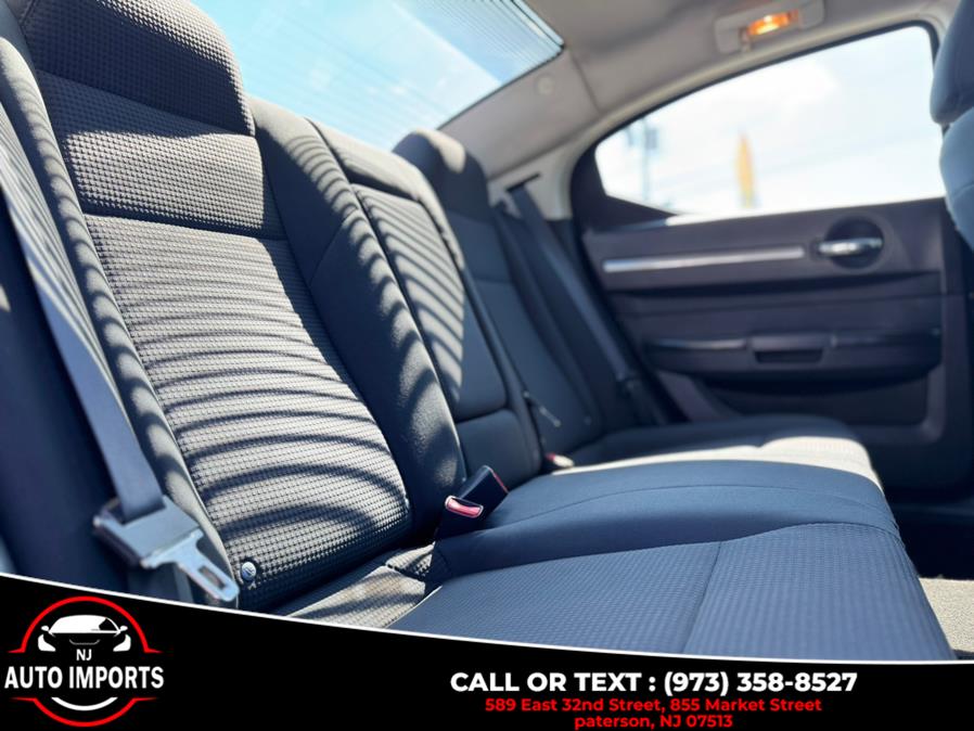 2010 Dodge Charger 4dr Sdn SXT RWD, available for sale in Paterson, New Jersey | NJ Auto Imports. Paterson, New Jersey 2010 Dodge Charger 4dr Sdn SXT RWD, available for sale in Paterson, New Jersey | NJ Auto Imports. Paterson, New Jersey