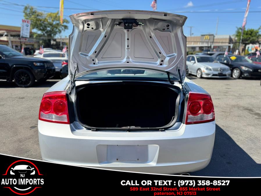 2010 Dodge Charger 4dr Sdn SXT RWD, available for sale in Paterson, New Jersey | NJ Auto Imports. Paterson, New Jersey 2010 Dodge Charger 4dr Sdn SXT RWD, available for sale in Paterson, New Jersey | NJ Auto Imports. Paterson, New Jersey