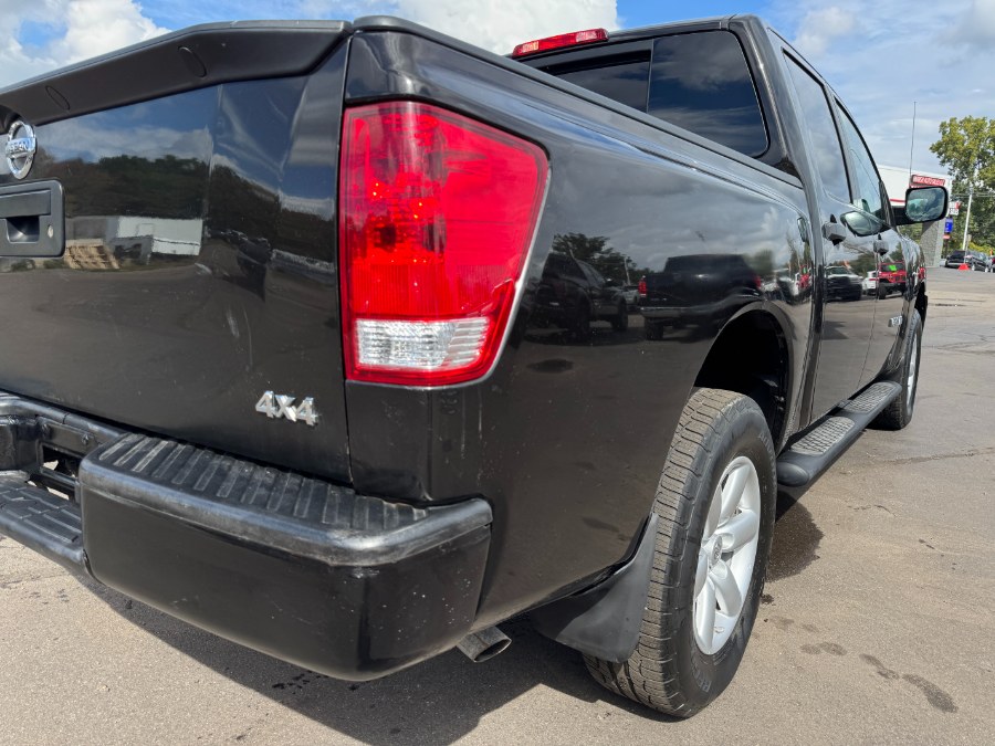 2013 Nissan Titan 4WD Crew Cab SWB S, available for sale in Ortonville, Michigan | Marsh Auto Sales LLC. Ortonville, Michigan 2013 Nissan Titan 4WD Crew Cab SWB S, available for sale in Ortonville, Michigan | Marsh Auto Sales LLC. Ortonville, Michigan