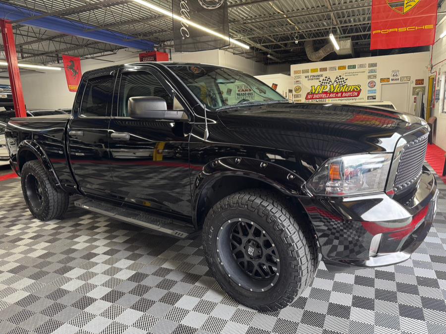 2014 Ram 1500 4WD Quad Cab 140.5" Express, available for sale in West Babylon , New York | MP Motors Inc. West Babylon , New York 2014 Ram 1500 4WD Quad Cab 140.5" Express, available for sale in West Babylon , New York | MP Motors Inc. West Babylon , New York