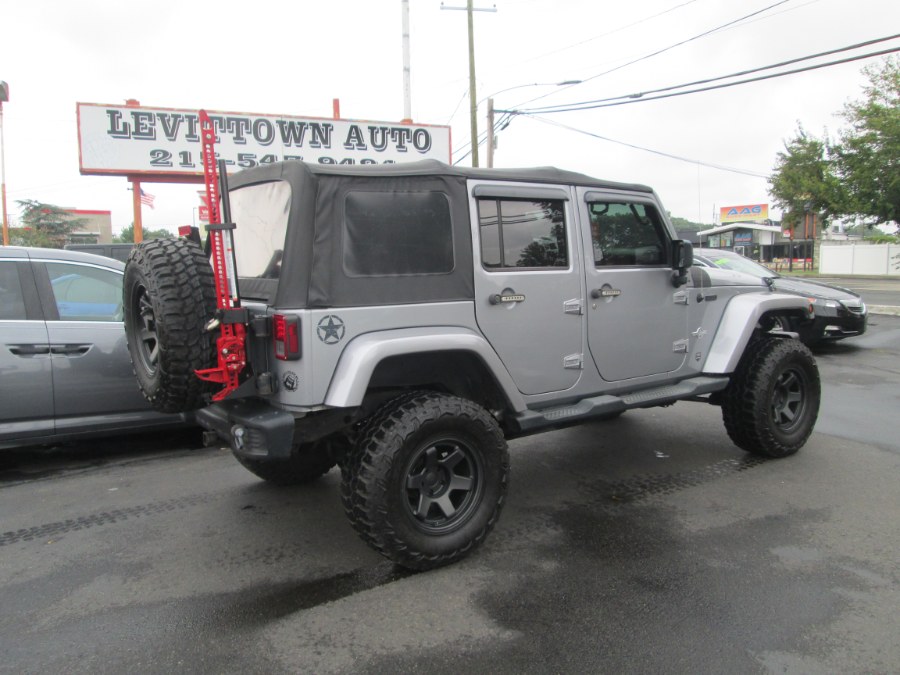 2014 Jeep Wrangler Unlimited 4WD 4dr FREEDOM EDITION, available for sale in Levittown, Pennsylvania | Levittown Auto. Levittown, Pennsylvania 2014 Jeep Wrangler Unlimited 4WD 4dr FREEDOM EDITION, available for sale in Levittown, Pennsylvania | Levittown Auto. Levittown, Pennsylvania