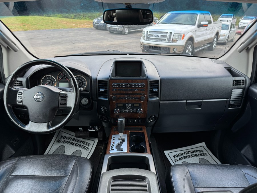 2012 Nissan Titan 4WD Crew Cab SWB PRO-4X, available for sale in Ortonville, Michigan | Marsh Auto Sales LLC. Ortonville, Michigan 2012 Nissan Titan 4WD Crew Cab SWB PRO-4X, available for sale in Ortonville, Michigan | Marsh Auto Sales LLC. Ortonville, Michigan