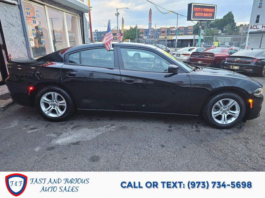 2022 Dodge Charger SXT Sedan 4D, available for sale in Newark, New Jersey | Fast and Furious Auto Sales. Newark, New Jersey 2022 Dodge Charger SXT Sedan 4D, available for sale in Newark, New Jersey | Fast and Furious Auto Sales. Newark, New Jersey