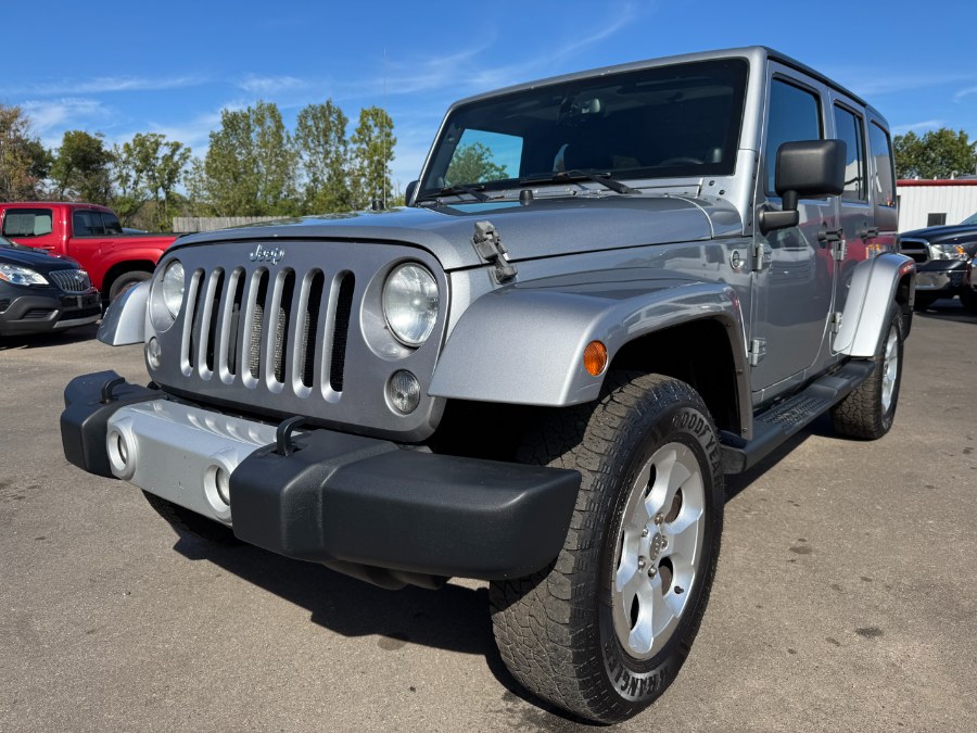 2014 Jeep Wrangler Unlimited 4WD 4dr Sahara, available for sale in Ortonville, Michigan | Marsh Auto Sales LLC. Ortonville, Michigan