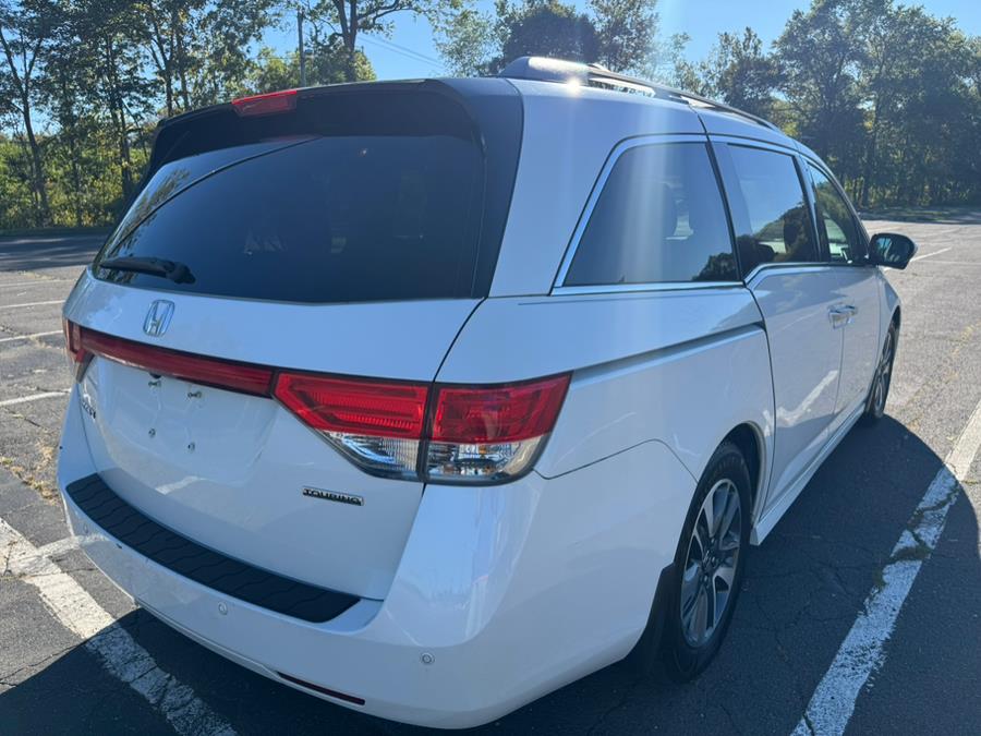 2014 Honda Odyssey 5dr Touring, available for sale in New Britain, Connecticut | Supreme Automotive. New Britain, Connecticut 2014 Honda Odyssey 5dr Touring, available for sale in New Britain, Connecticut | Supreme Automotive. New Britain, Connecticut