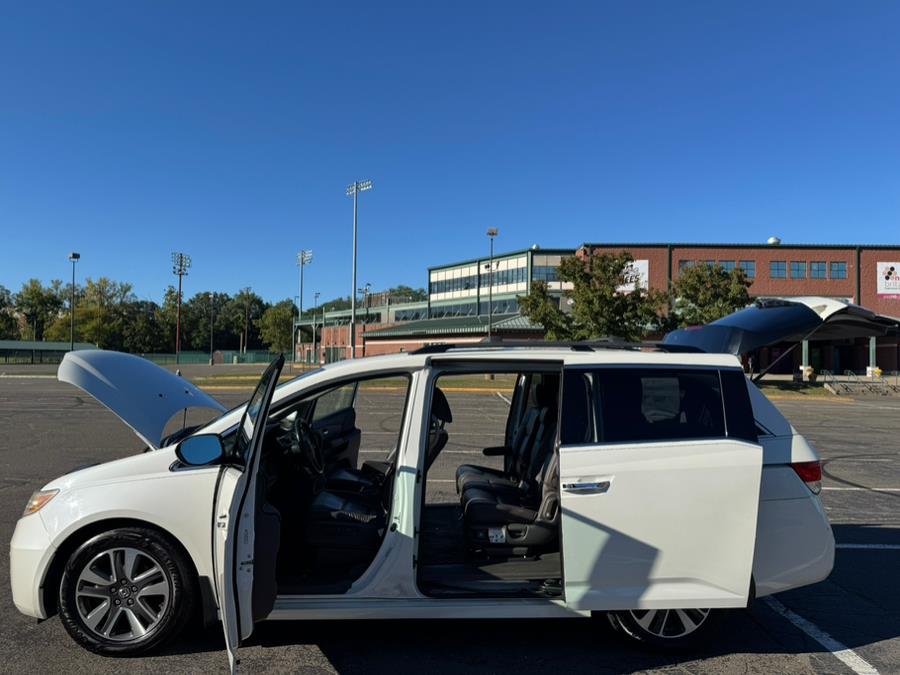 2014 Honda Odyssey 5dr Touring, available for sale in New Britain, Connecticut | Supreme Automotive. New Britain, Connecticut 2014 Honda Odyssey 5dr Touring, available for sale in New Britain, Connecticut | Supreme Automotive. New Britain, Connecticut