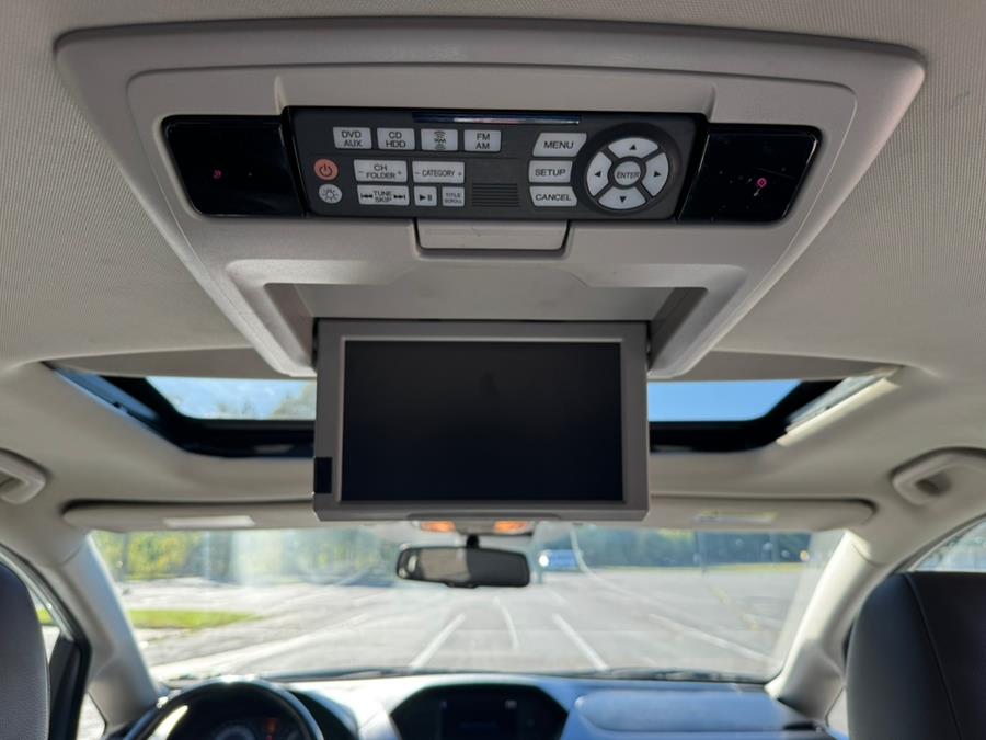 2014 Honda Odyssey 5dr Touring, available for sale in New Britain, Connecticut | Supreme Automotive. New Britain, Connecticut 2014 Honda Odyssey 5dr Touring, available for sale in New Britain, Connecticut | Supreme Automotive. New Britain, Connecticut