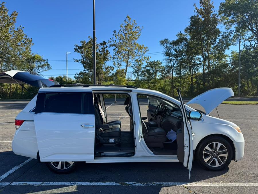 2014 Honda Odyssey 5dr Touring, available for sale in New Britain, Connecticut | Supreme Automotive. New Britain, Connecticut 2014 Honda Odyssey 5dr Touring, available for sale in New Britain, Connecticut | Supreme Automotive. New Britain, Connecticut