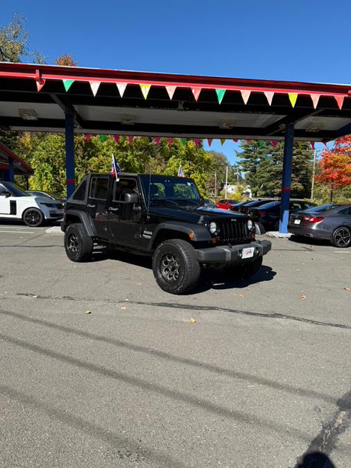 2013 Jeep Wrangler Unlimited 4WD 4dr Sport, available for sale in Windsor Locks, Connecticut | JANNA MOTORS LLC. Windsor Locks, Connecticut 2013 Jeep Wrangler Unlimited 4WD 4dr Sport, available for sale in Windsor Locks, Connecticut | JANNA MOTORS LLC. Windsor Locks, Connecticut