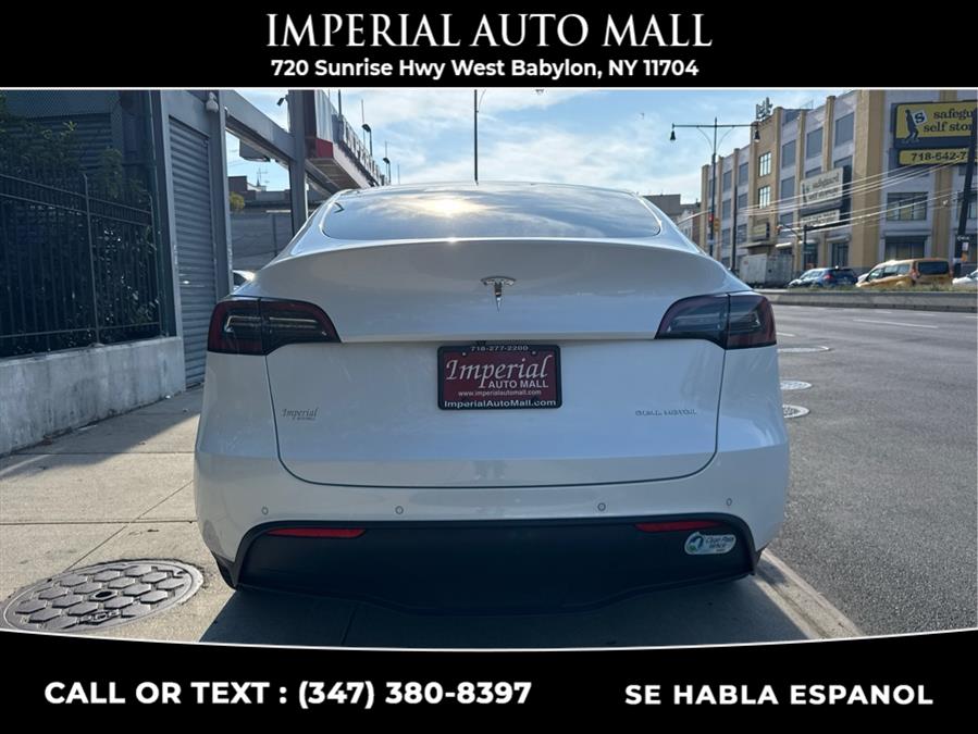 2021 Tesla Model Y Long Range AWD, available for sale in West Babylon, New York | Imperial Auto Mall. West Babylon, New York 2021 Tesla Model Y Long Range AWD, available for sale in West Babylon, New York | Imperial Auto Mall. West Babylon, New York