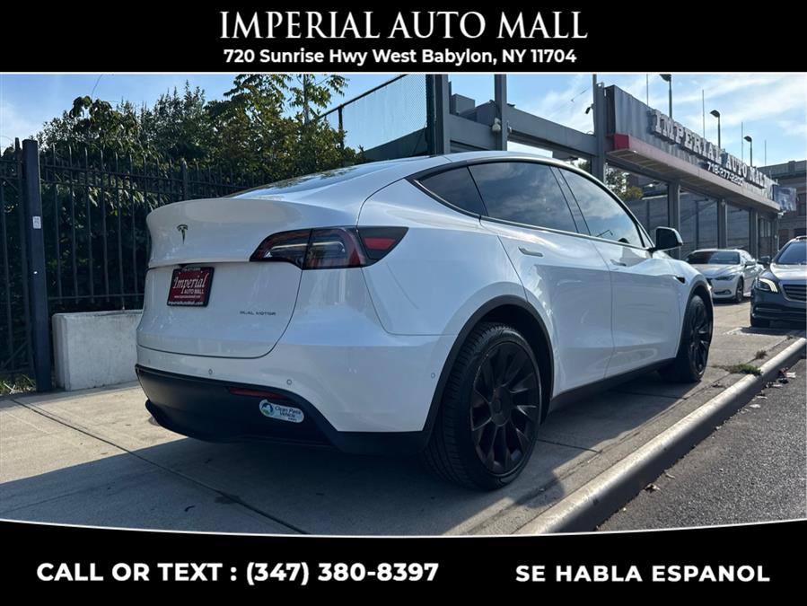 2021 Tesla Model Y Long Range AWD, available for sale in West Babylon, New York | Imperial Auto Mall. West Babylon, New York 2021 Tesla Model Y Long Range AWD, available for sale in West Babylon, New York | Imperial Auto Mall. West Babylon, New York