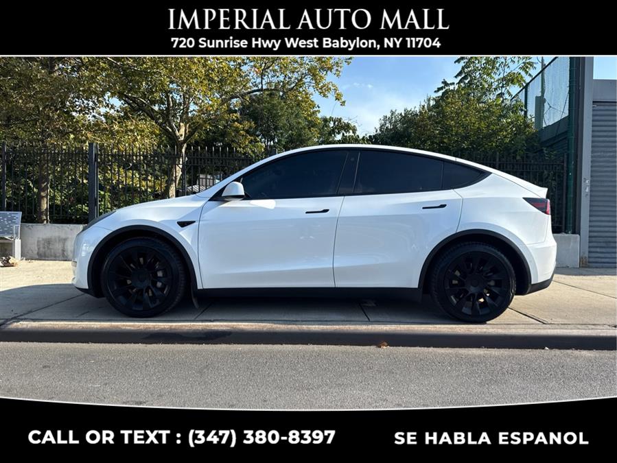 2021 Tesla Model Y Long Range AWD, available for sale in West Babylon, New York | Imperial Auto Mall. West Babylon, New York 2021 Tesla Model Y Long Range AWD, available for sale in West Babylon, New York | Imperial Auto Mall. West Babylon, New York