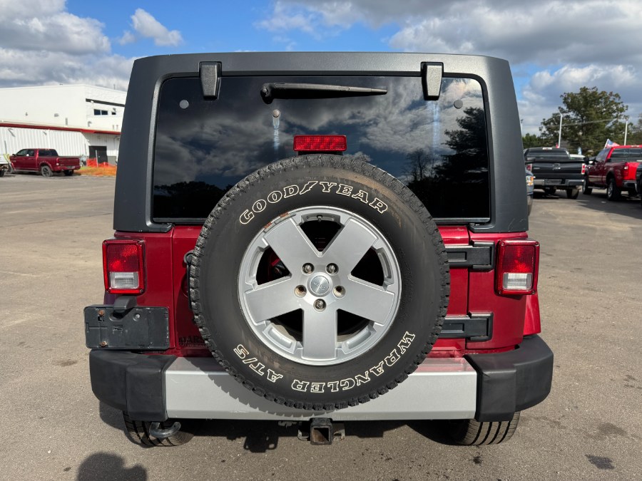 2011 Jeep Wrangler Unlimited 4WD 4dr Sahara, available for sale in Ortonville, Michigan | Marsh Auto Sales LLC. Ortonville, Michigan 2011 Jeep Wrangler Unlimited 4WD 4dr Sahara, available for sale in Ortonville, Michigan | Marsh Auto Sales LLC. Ortonville, Michigan