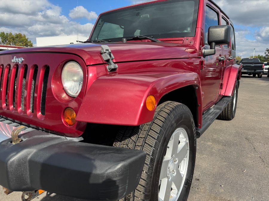 2011 Jeep Wrangler Unlimited 4WD 4dr Sahara, available for sale in Ortonville, Michigan | Marsh Auto Sales LLC. Ortonville, Michigan 2011 Jeep Wrangler Unlimited 4WD 4dr Sahara, available for sale in Ortonville, Michigan | Marsh Auto Sales LLC. Ortonville, Michigan