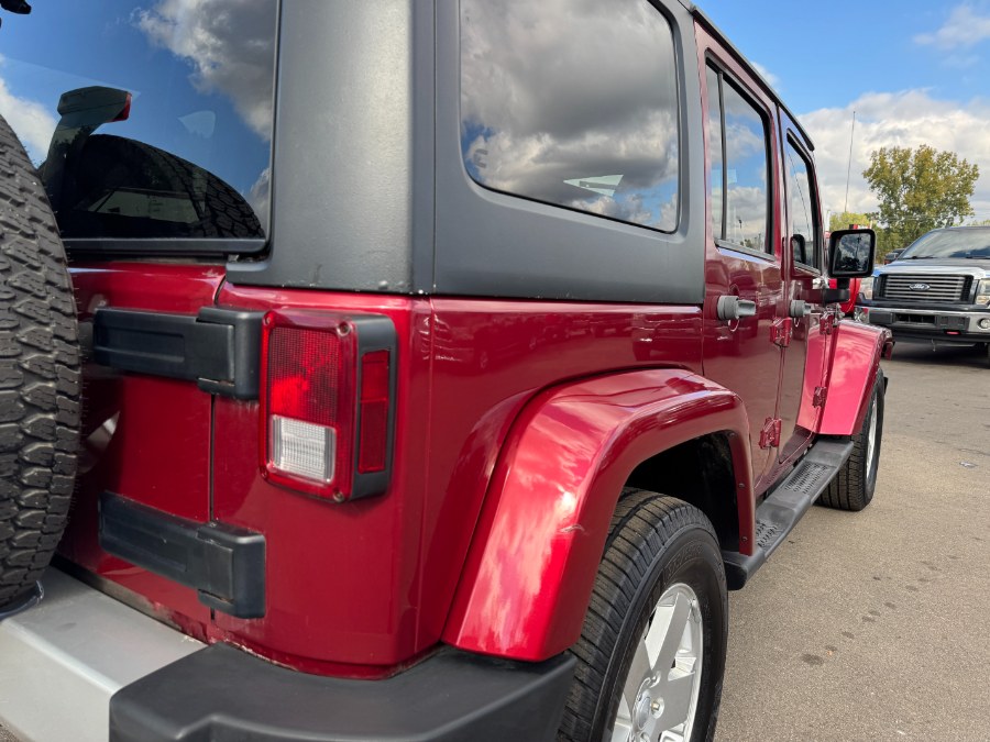 2011 Jeep Wrangler Unlimited 4WD 4dr Sahara, available for sale in Ortonville, Michigan | Marsh Auto Sales LLC. Ortonville, Michigan 2011 Jeep Wrangler Unlimited 4WD 4dr Sahara, available for sale in Ortonville, Michigan | Marsh Auto Sales LLC. Ortonville, Michigan
