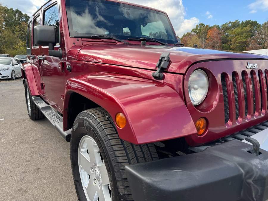 2011 Jeep Wrangler Unlimited 4WD 4dr Sahara, available for sale in Ortonville, Michigan | Marsh Auto Sales LLC. Ortonville, Michigan 2011 Jeep Wrangler Unlimited 4WD 4dr Sahara, available for sale in Ortonville, Michigan | Marsh Auto Sales LLC. Ortonville, Michigan