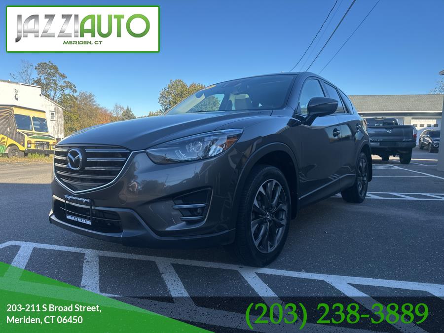 2016 Mazda CX-5 AWD 4dr Auto Grand Touring, available for sale in Meriden, Connecticut | Jazzi Auto Sales LLC. Meriden, Connecticut 2016 Mazda CX-5 AWD 4dr Auto Grand Touring, available for sale in Meriden, Connecticut | Jazzi Auto Sales LLC. Meriden, Connecticut