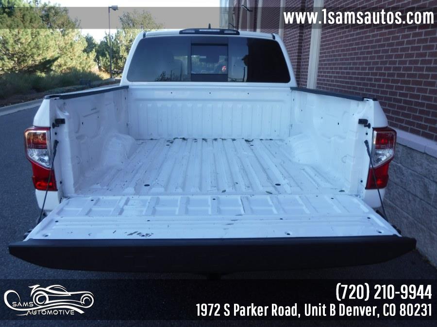 2023 Nissan Titan 4x4 Crew Cab S, available for sale in Denver, Colorado | Sam's Automotive. Denver, Colorado 2023 Nissan Titan 4x4 Crew Cab S, available for sale in Denver, Colorado | Sam's Automotive. Denver, Colorado