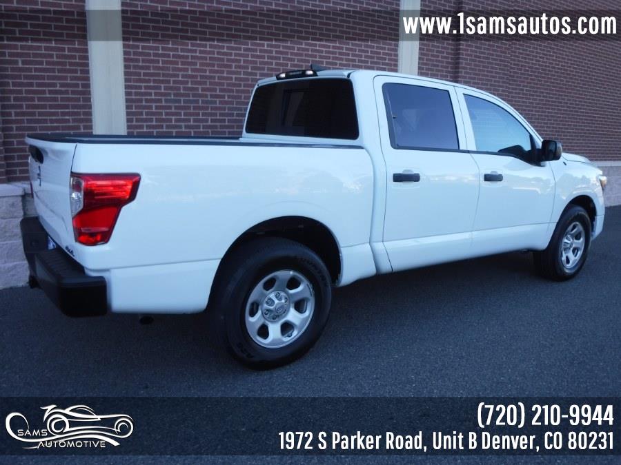 2023 Nissan Titan 4x4 Crew Cab S, available for sale in Denver, Colorado | Sam's Automotive. Denver, Colorado 2023 Nissan Titan 4x4 Crew Cab S, available for sale in Denver, Colorado | Sam's Automotive. Denver, Colorado