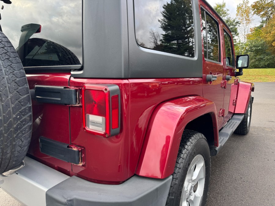 2013 Jeep Wrangler Unlimited 4WD 4dr Sahara, available for sale in Ortonville, Michigan | Marsh Auto Sales LLC. Ortonville, Michigan 2013 Jeep Wrangler Unlimited 4WD 4dr Sahara, available for sale in Ortonville, Michigan | Marsh Auto Sales LLC. Ortonville, Michigan