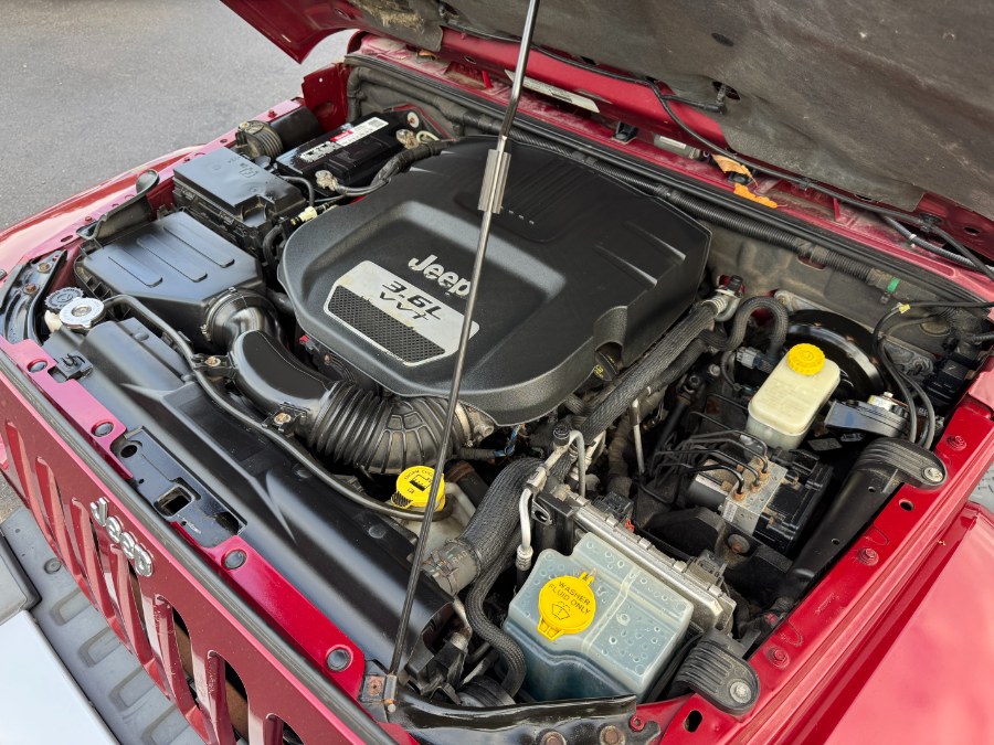 2013 Jeep Wrangler Unlimited 4WD 4dr Sahara, available for sale in Ortonville, Michigan | Marsh Auto Sales LLC. Ortonville, Michigan 2013 Jeep Wrangler Unlimited 4WD 4dr Sahara, available for sale in Ortonville, Michigan | Marsh Auto Sales LLC. Ortonville, Michigan