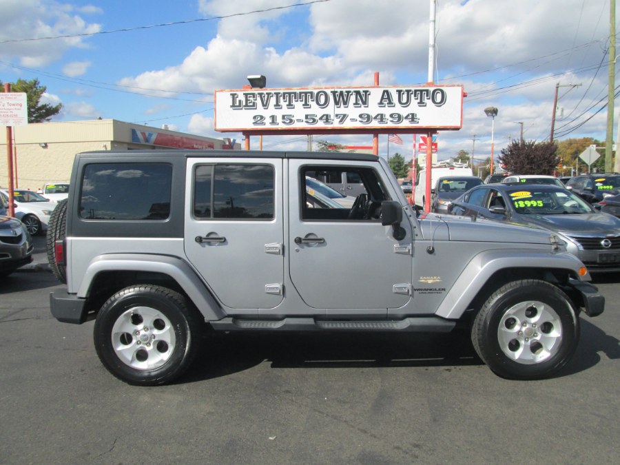 2013 Jeep Wrangler Unlimited 4WD 4dr Sahara, available for sale in Levittown, Pennsylvania | Levittown Auto. Levittown, Pennsylvania 2013 Jeep Wrangler Unlimited 4WD 4dr Sahara, available for sale in Levittown, Pennsylvania | Levittown Auto. Levittown, Pennsylvania