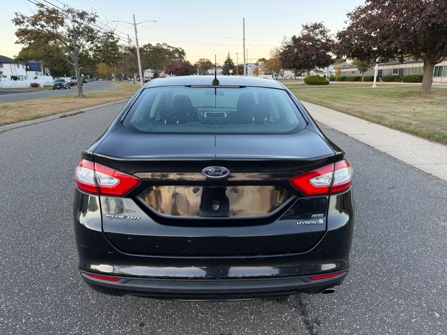 2013 Ford Fusion 4dr Sdn SE Hybrid FWD, available for sale in Copiague, New York | Great Deal Motors. Copiague, New York 2013 Ford Fusion 4dr Sdn SE Hybrid FWD, available for sale in Copiague, New York | Great Deal Motors. Copiague, New York