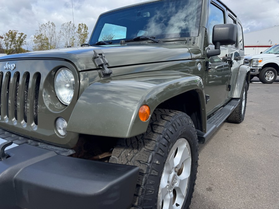 2015 Jeep Wrangler Unlimited 4WD 4dr Sahara, available for sale in Ortonville, Michigan | Marsh Auto Sales LLC. Ortonville, Michigan 2015 Jeep Wrangler Unlimited 4WD 4dr Sahara, available for sale in Ortonville, Michigan | Marsh Auto Sales LLC. Ortonville, Michigan