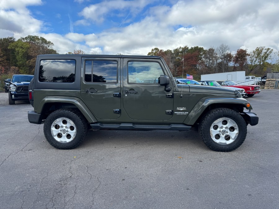 2015 Jeep Wrangler Unlimited 4WD 4dr Sahara, available for sale in Ortonville, Michigan | Marsh Auto Sales LLC. Ortonville, Michigan 2015 Jeep Wrangler Unlimited 4WD 4dr Sahara, available for sale in Ortonville, Michigan | Marsh Auto Sales LLC. Ortonville, Michigan