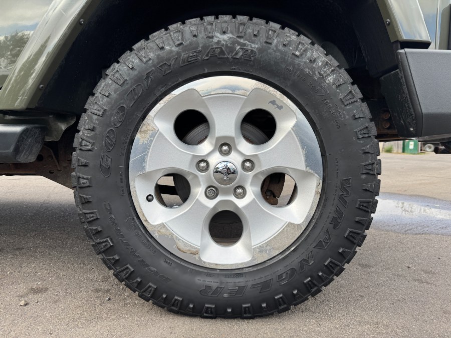 2015 Jeep Wrangler Unlimited 4WD 4dr Sahara, available for sale in Ortonville, Michigan | Marsh Auto Sales LLC. Ortonville, Michigan 2015 Jeep Wrangler Unlimited 4WD 4dr Sahara, available for sale in Ortonville, Michigan | Marsh Auto Sales LLC. Ortonville, Michigan