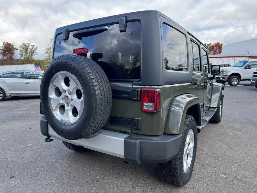 2015 Jeep Wrangler Unlimited 4WD 4dr Sahara, available for sale in Ortonville, Michigan | Marsh Auto Sales LLC. Ortonville, Michigan 2015 Jeep Wrangler Unlimited 4WD 4dr Sahara, available for sale in Ortonville, Michigan | Marsh Auto Sales LLC. Ortonville, Michigan