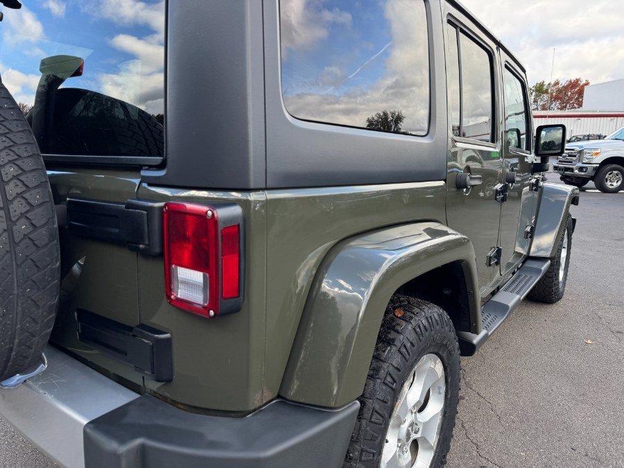 2015 Jeep Wrangler Unlimited 4WD 4dr Sahara, available for sale in Ortonville, Michigan | Marsh Auto Sales LLC. Ortonville, Michigan 2015 Jeep Wrangler Unlimited 4WD 4dr Sahara, available for sale in Ortonville, Michigan | Marsh Auto Sales LLC. Ortonville, Michigan