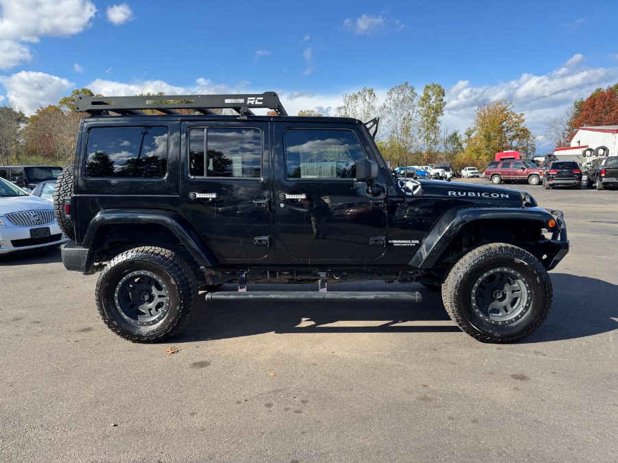 2013 Jeep Wrangler Unlimited 4WD 4dr Rubicon, available for sale in Ortonville, Michigan | Marsh Auto Sales LLC. Ortonville, Michigan 2013 Jeep Wrangler Unlimited 4WD 4dr Rubicon, available for sale in Ortonville, Michigan | Marsh Auto Sales LLC. Ortonville, Michigan