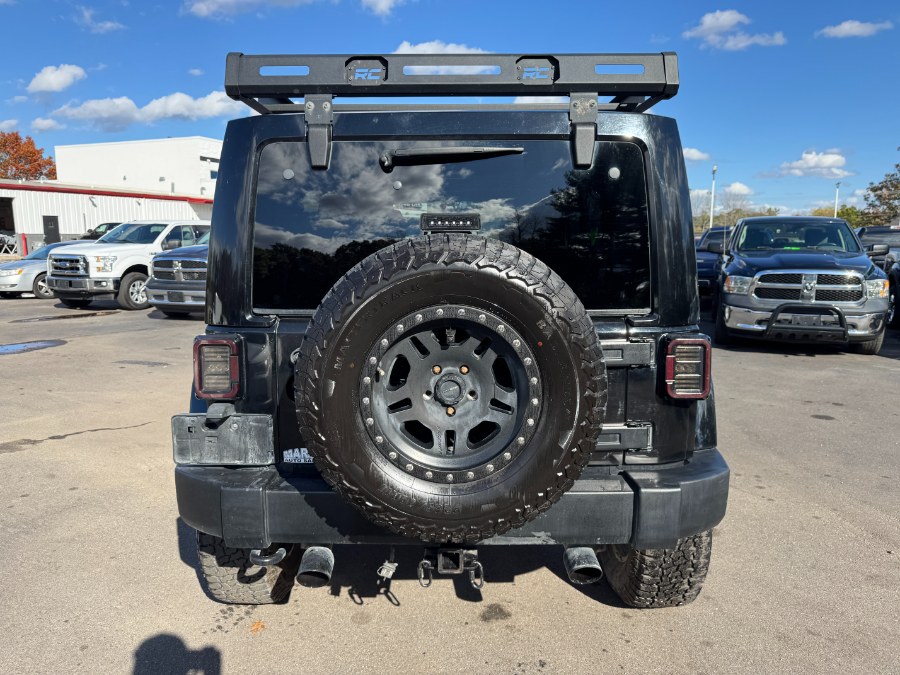 2013 Jeep Wrangler Unlimited 4WD 4dr Rubicon, available for sale in Ortonville, Michigan | Marsh Auto Sales LLC. Ortonville, Michigan 2013 Jeep Wrangler Unlimited 4WD 4dr Rubicon, available for sale in Ortonville, Michigan | Marsh Auto Sales LLC. Ortonville, Michigan