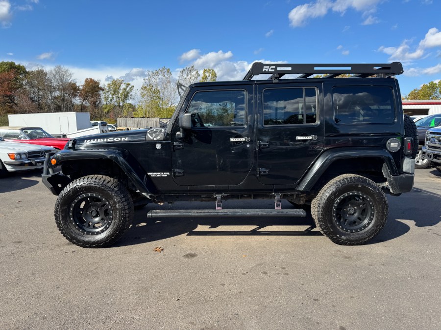 2013 Jeep Wrangler Unlimited 4WD 4dr Rubicon, available for sale in Ortonville, Michigan | Marsh Auto Sales LLC. Ortonville, Michigan 2013 Jeep Wrangler Unlimited 4WD 4dr Rubicon, available for sale in Ortonville, Michigan | Marsh Auto Sales LLC. Ortonville, Michigan
