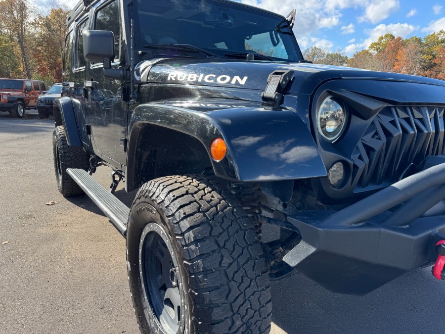 2013 Jeep Wrangler Unlimited 4WD 4dr Rubicon, available for sale in Ortonville, Michigan | Marsh Auto Sales LLC. Ortonville, Michigan 2013 Jeep Wrangler Unlimited 4WD 4dr Rubicon, available for sale in Ortonville, Michigan | Marsh Auto Sales LLC. Ortonville, Michigan