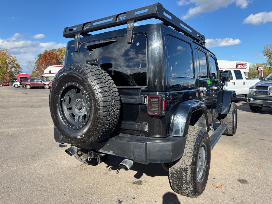 2013 Jeep Wrangler Unlimited 4WD 4dr Rubicon, available for sale in Ortonville, Michigan | Marsh Auto Sales LLC. Ortonville, Michigan 2013 Jeep Wrangler Unlimited 4WD 4dr Rubicon, available for sale in Ortonville, Michigan | Marsh Auto Sales LLC. Ortonville, Michigan