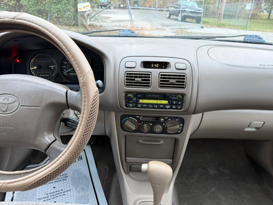 1999 Toyota Corolla 4dr Sdn CE Auto, available for sale in New Milford, Connecticut | Faustos Auto Body and Repairs LLC. New Milford, Connecticut 1999 Toyota Corolla 4dr Sdn CE Auto, available for sale in New Milford, Connecticut | Faustos Auto Body and Repairs LLC. New Milford, Connecticut
