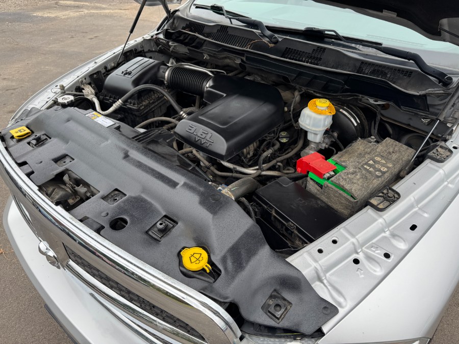 2016 Ram 1500 4WD Quad Cab 140.5" SLT, available for sale in Ortonville, Michigan | Marsh Auto Sales LLC. Ortonville, Michigan 2016 Ram 1500 4WD Quad Cab 140.5" SLT, available for sale in Ortonville, Michigan | Marsh Auto Sales LLC. Ortonville, Michigan