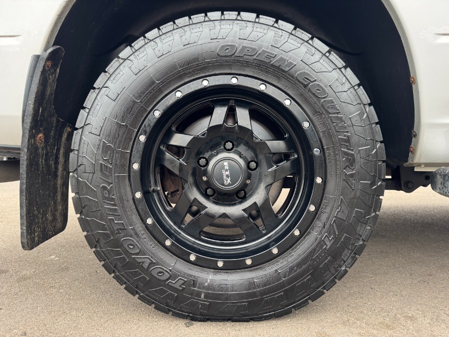 2016 Ram 1500 4WD Quad Cab 140.5" SLT, available for sale in Ortonville, Michigan | Marsh Auto Sales LLC. Ortonville, Michigan 2016 Ram 1500 4WD Quad Cab 140.5" SLT, available for sale in Ortonville, Michigan | Marsh Auto Sales LLC. Ortonville, Michigan